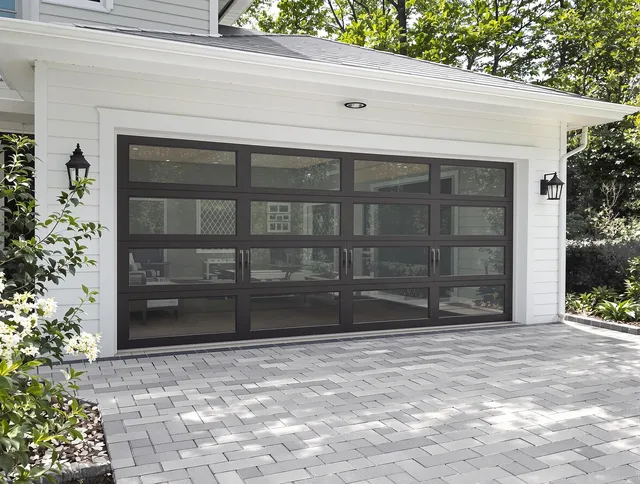 Garfield Heights Garage Door Repair design specialist presenting custom garage door options to Garfield Heights homeowner