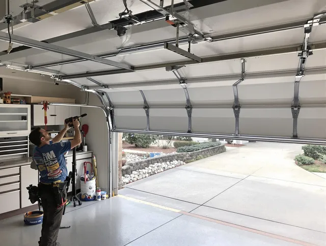 Garage door track repair service by Garfield Heights Garage Door Repair in Garfield Heights